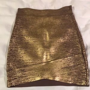 Women’s BCBG MAXAZRIA body con gold skirt